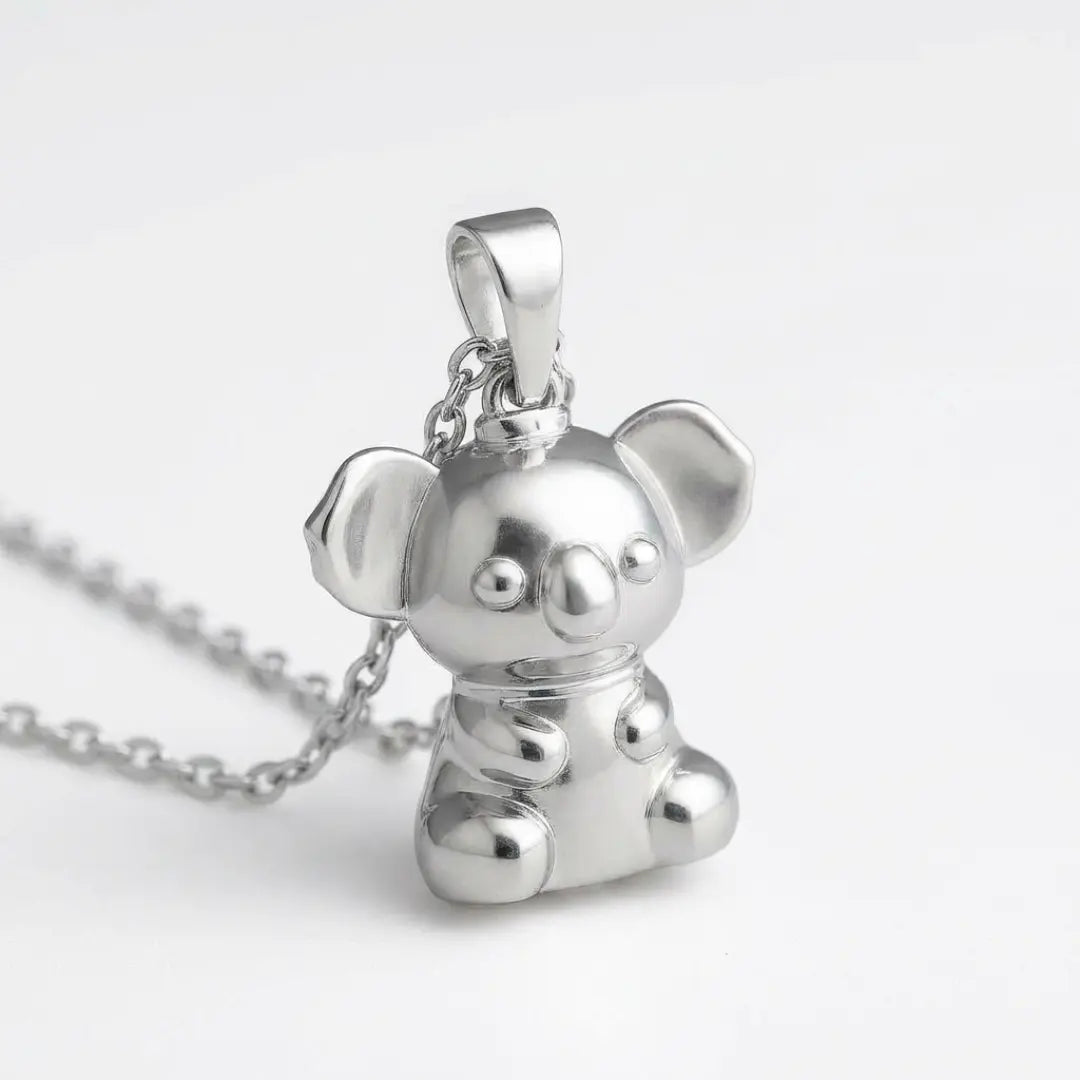 Silver 3d koala pendant on a chain against a white background