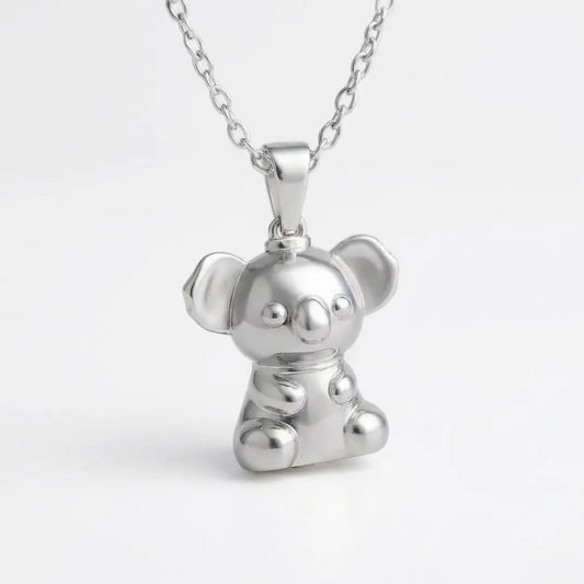 Silver 3d koala pendant necklace on a light grey background