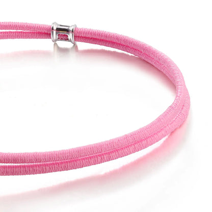 Pink Bracelet with a silver clasp on a white background