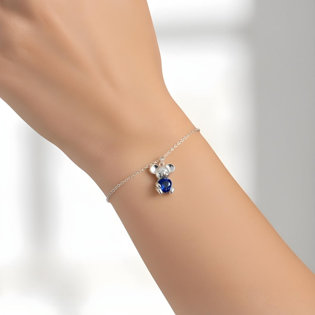 Sterling Silver Koala Charm Bracelet with Heart-Shaped Blue Sapphire CZ