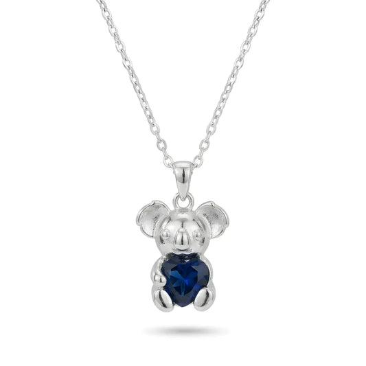 Silver Koala pendant with a Sapphire heart-shaped CZ on a white background
